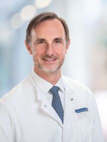 Portrait von Prof. Dr. med. Dr. rer. nat. Jürgen Debus Portrait von Prof. Dr. med. Dr. rer. nat. Jürgen Debus